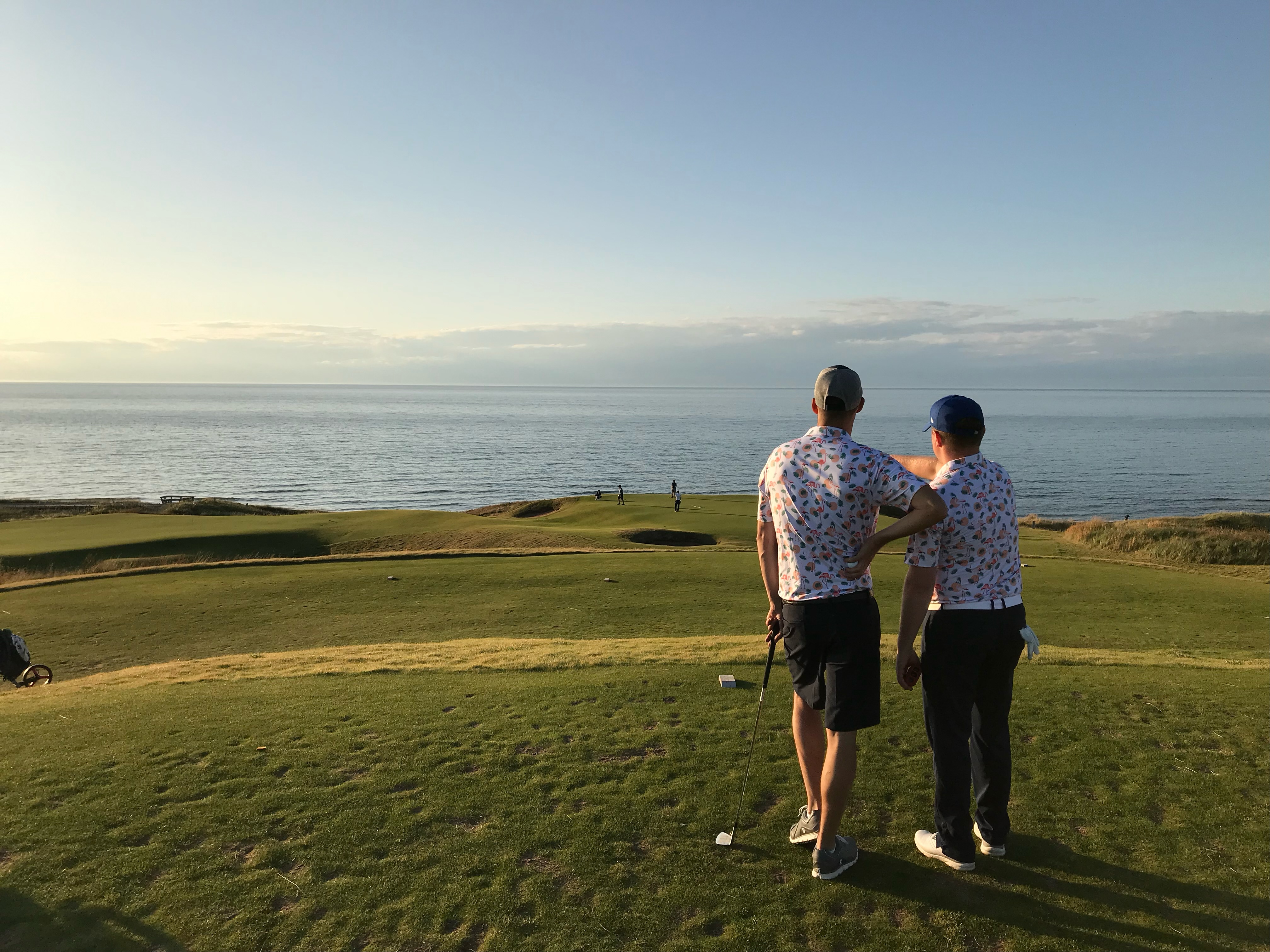 Flamingos players reading the 14th hole