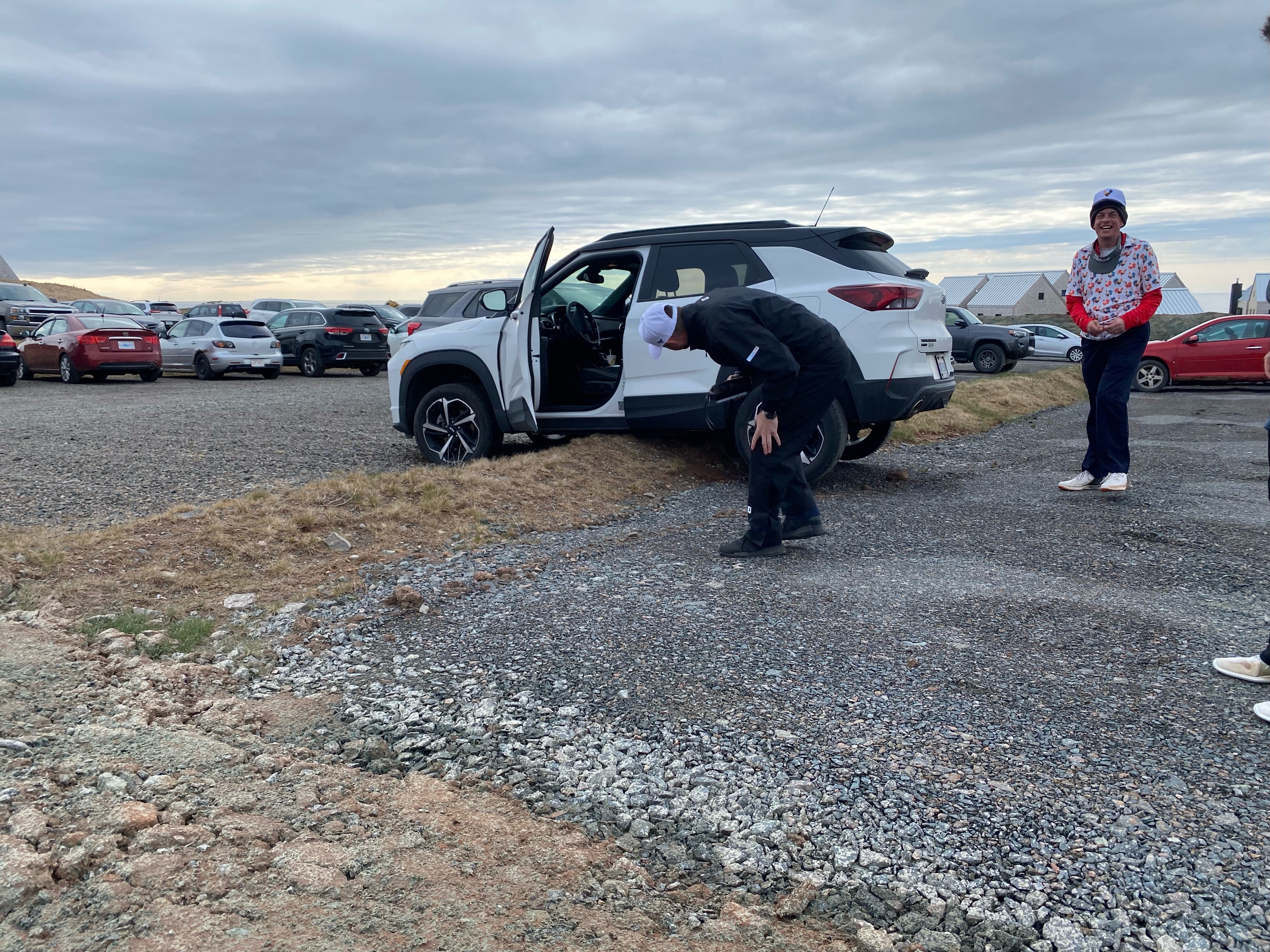 A golf cart stopped on a mound