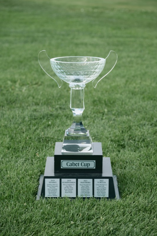 The Cabot Cup trophy standing on the grass